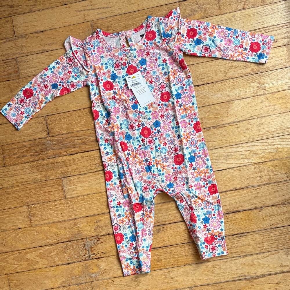 Tea ruffle shoulder baby romper